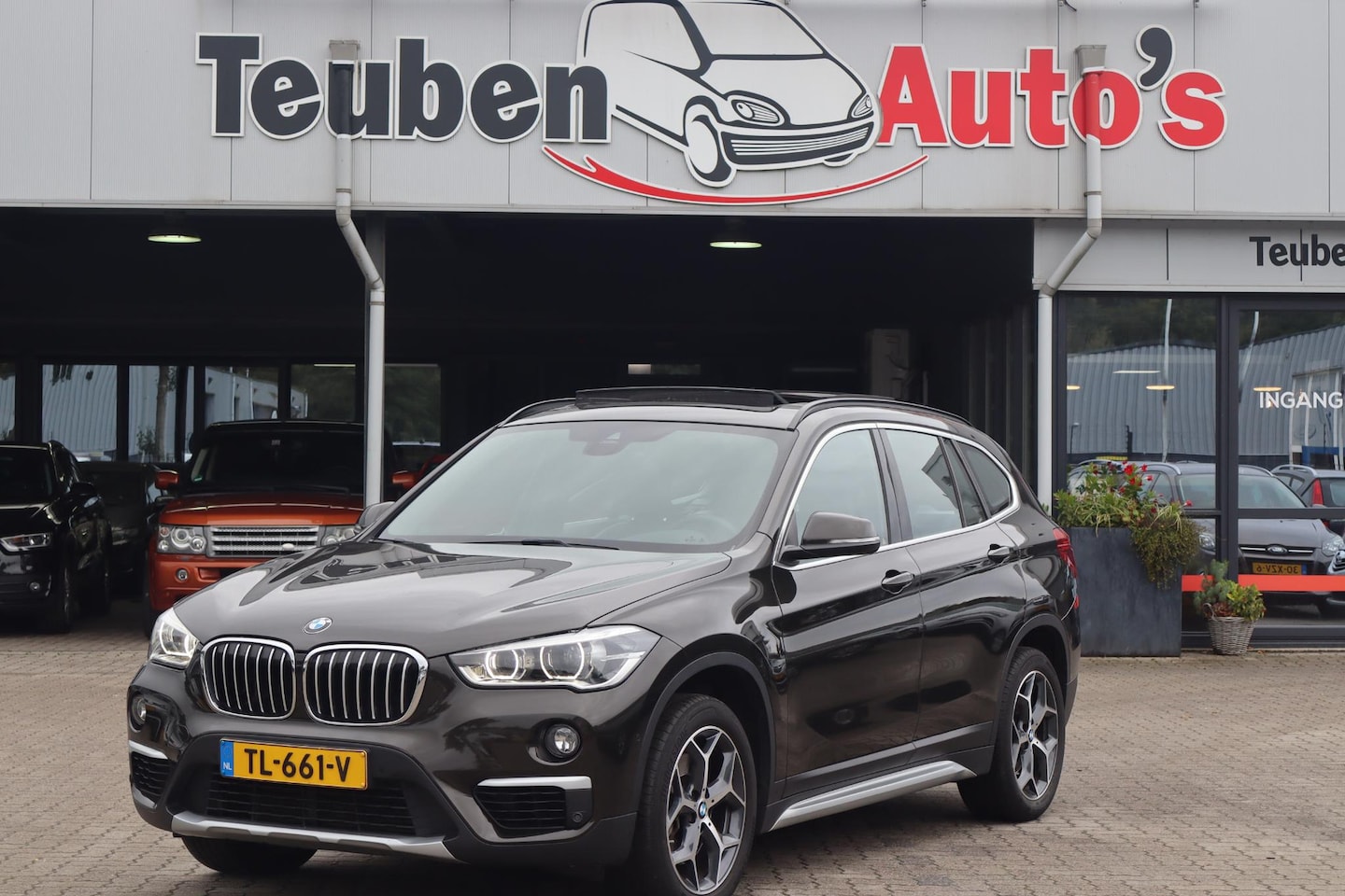 BMW X1 - sDrive20i High Executive Panoramadak, Schuif- kanteldak, Navigatie, Camera, Lederen interi - AutoWereld.nl