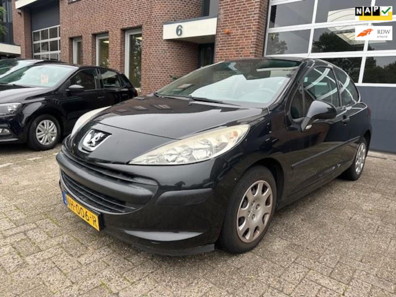 Peugeot 207 - 1.4-16V XR / bj.2007 / kleur: zwart/ 147604 km.en APK tot 02/2026 / airco/stereo/etc./zo i - AutoWereld.nl