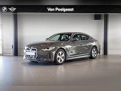 BMW i4 - eDrive40 High Executive 84 kWh | Stoelverwarming | Achteruitrijcamera | Trekhaak |