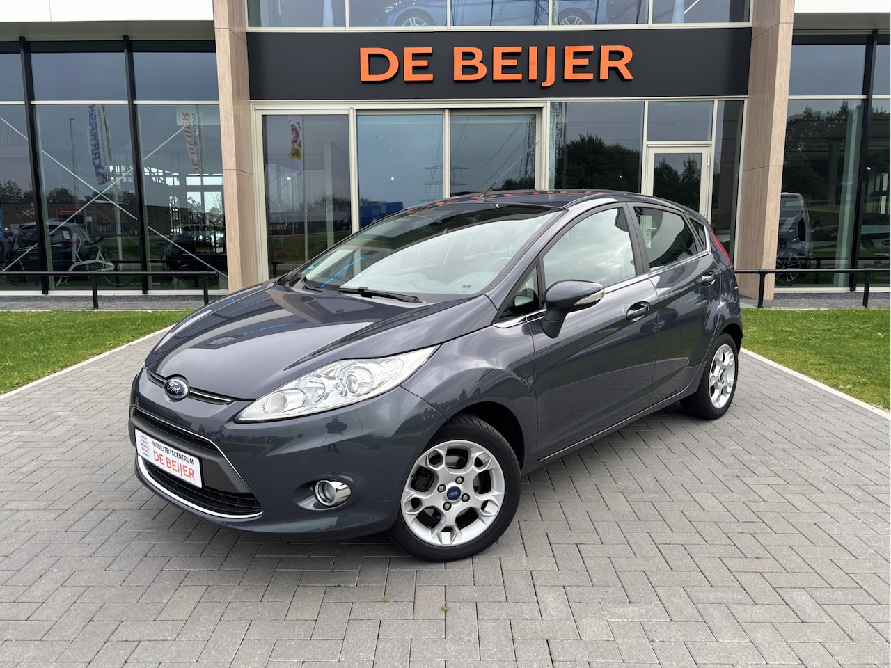 Ford Fiesta - 1.25 Titanium Airco I Bluetooth I Cruise - AutoWereld.nl