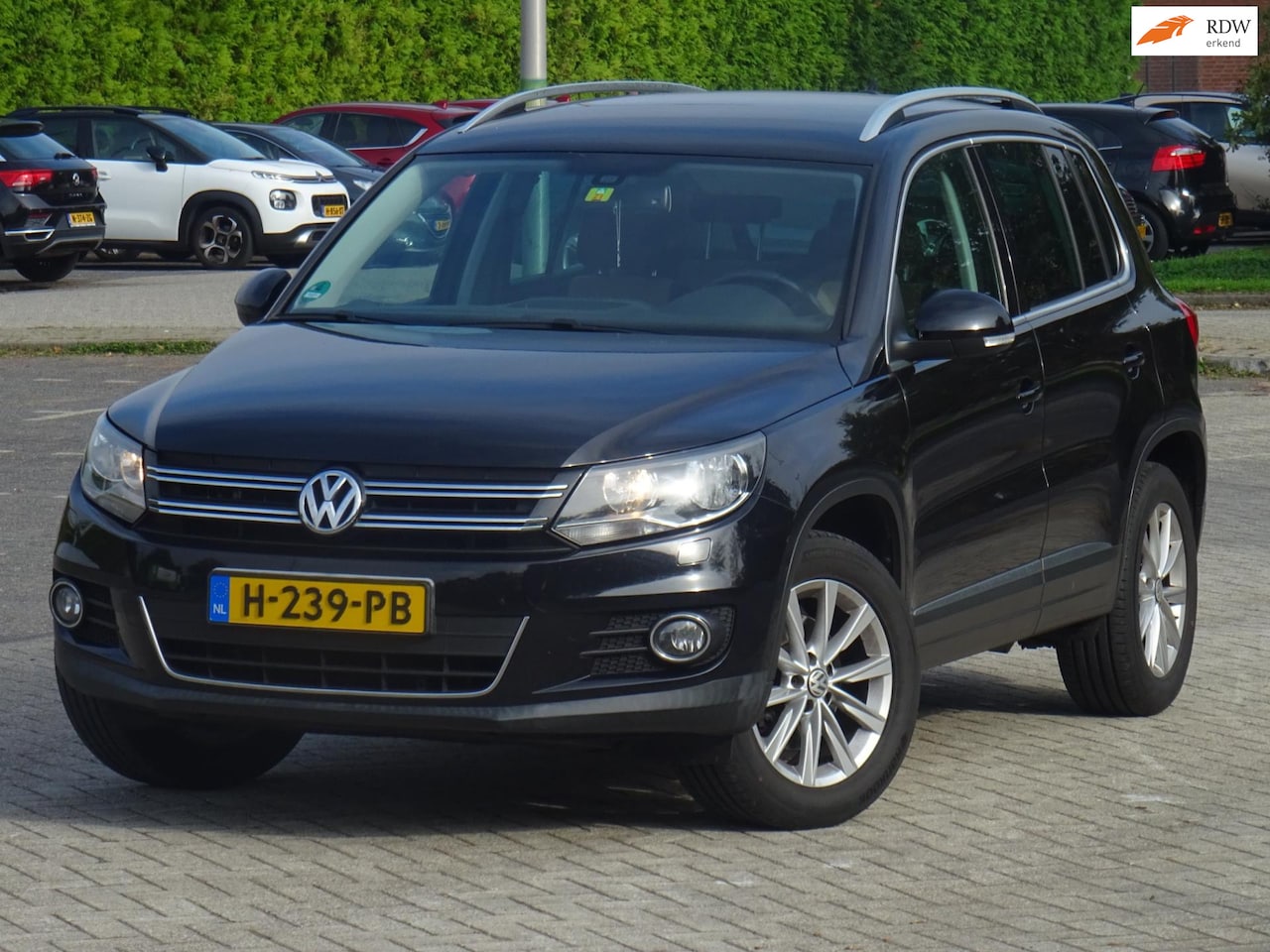 Volkswagen Tiguan - 1.4 TSI Sport&Style BJ2012 NAVI/CRUISE/PDC - AutoWereld.nl