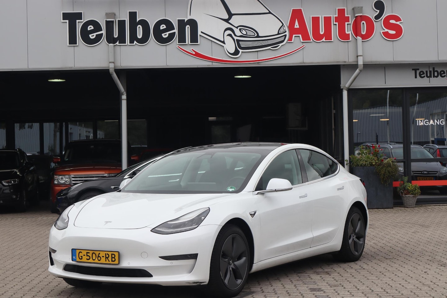 Tesla Model 3 - Long Range RWD Long Range AWD 75 kWh Autopilot, Camera, Panoramadak, Lederen interieur - AutoWereld.nl
