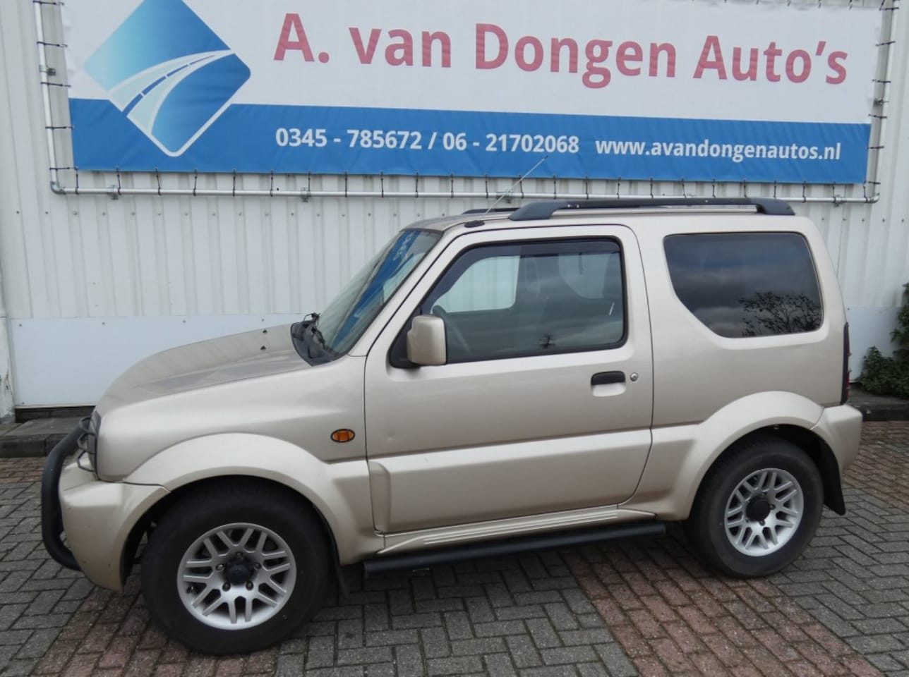 Suzuki Jimny - 1.3 SPECIAL ED.Automaat 4WD,AIrco,PDC,Navi,APK 7-10-26 - AutoWereld.nl