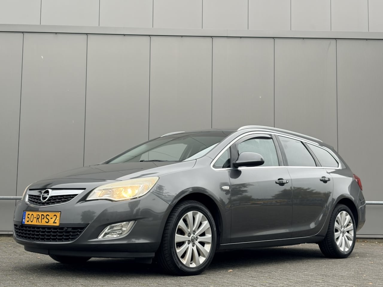 Opel Astra Sports Tourer - 1.4 Turbo Cosmo - automaat - airco - cruise - trekhaak - - AutoWereld.nl