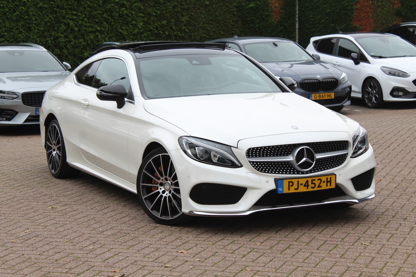 Mercedes-Benz C-klasse Coupé - 250 Prestige / Panoramadak / Camera / Burmester / Leder / 19'' / Dodehoek / DAB / Nightpak - AutoWereld.nl