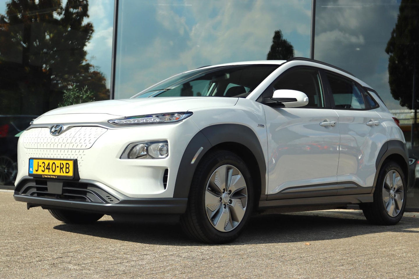 Hyundai Kona Electric - EV COMFORT 64 KWH 3 FASE | CARPLAY | ACC | CAMERA | KRELL AUDIO | KEY-LESS - AutoWereld.nl