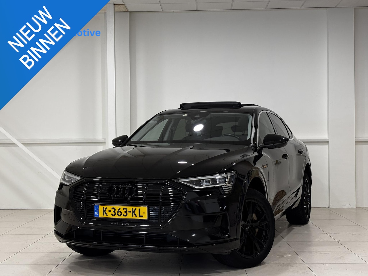 Audi e-tron Sportback - 55 quattro Business edition Plus 95 kWh | Panorama dak | Navigatie | Hoge instap | Trekhaa - AutoWereld.nl