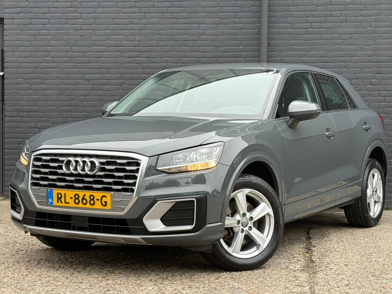 Audi Q2 - 1.0 TFSI Sport AIRCO | NAVI | AUTOMAAT | NWE APK - AutoWereld.nl