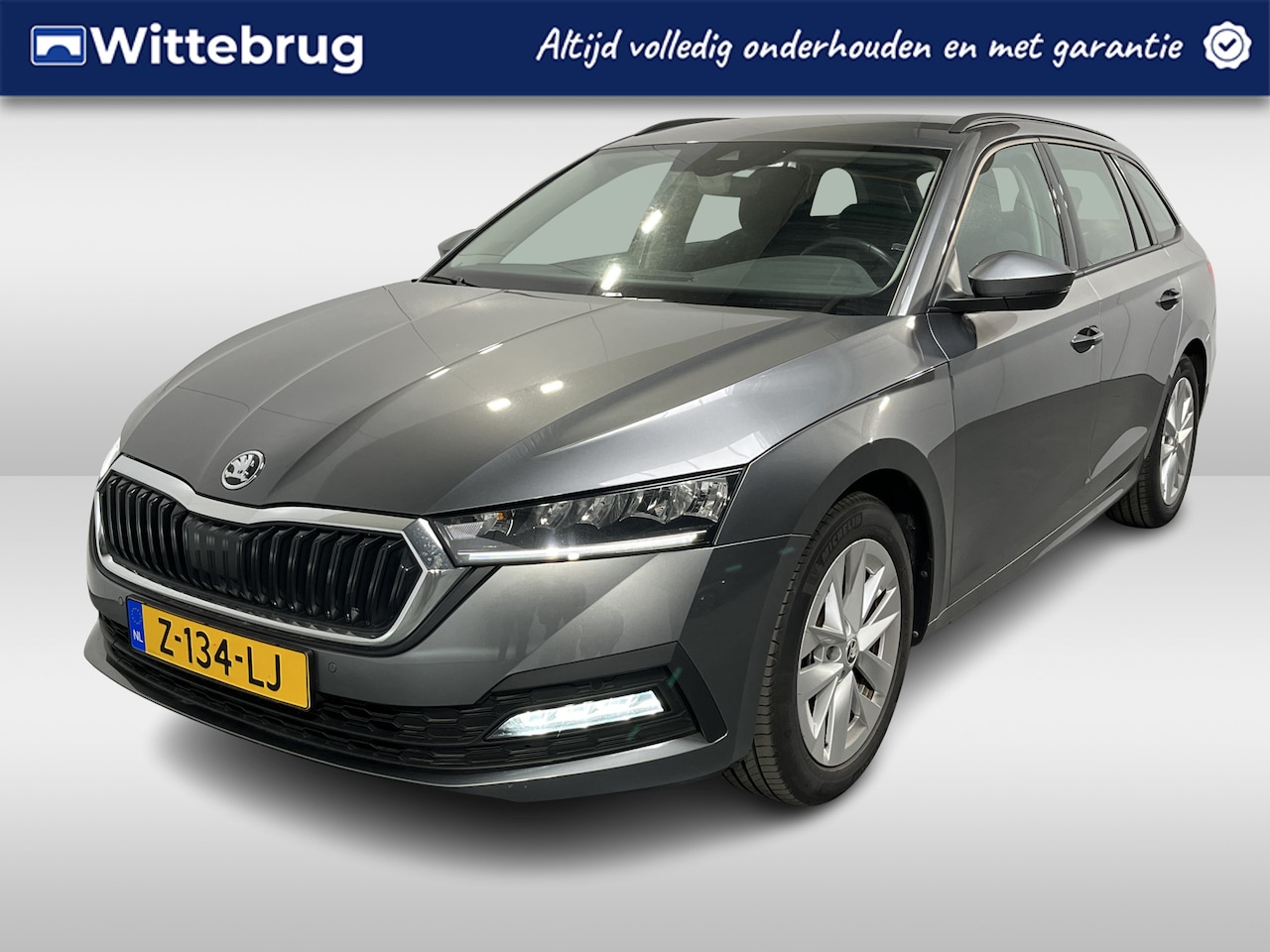 Skoda Octavia Combi - 1.0 e-TSI Business Edition / AUTOMAAT/ GARANTIE TM 05-2028/ TREKHAAK WEGKLAPBAAR/ PARK. SE - AutoWereld.nl
