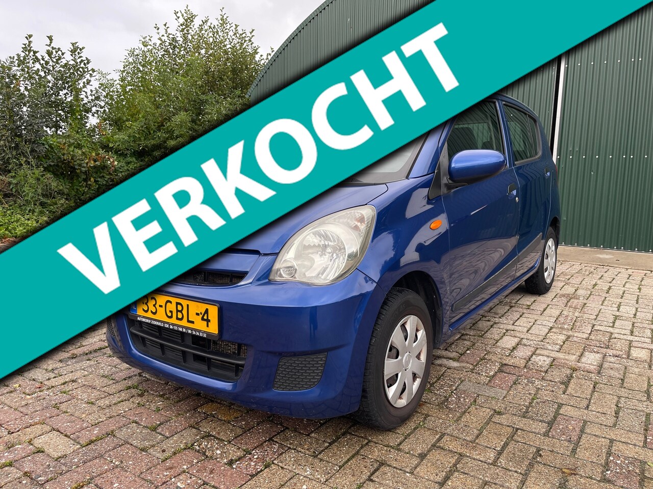 Daihatsu Cuore - 1.0 Trend / New APK! - AutoWereld.nl