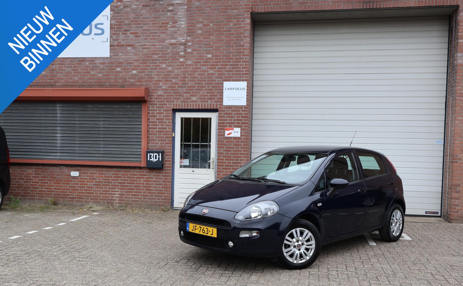 Fiat Punto Evo - 0.9 TwinAir Lounge 1e eigenaar  Cruise NAP Airco Trekhaak APK - AutoWereld.nl
