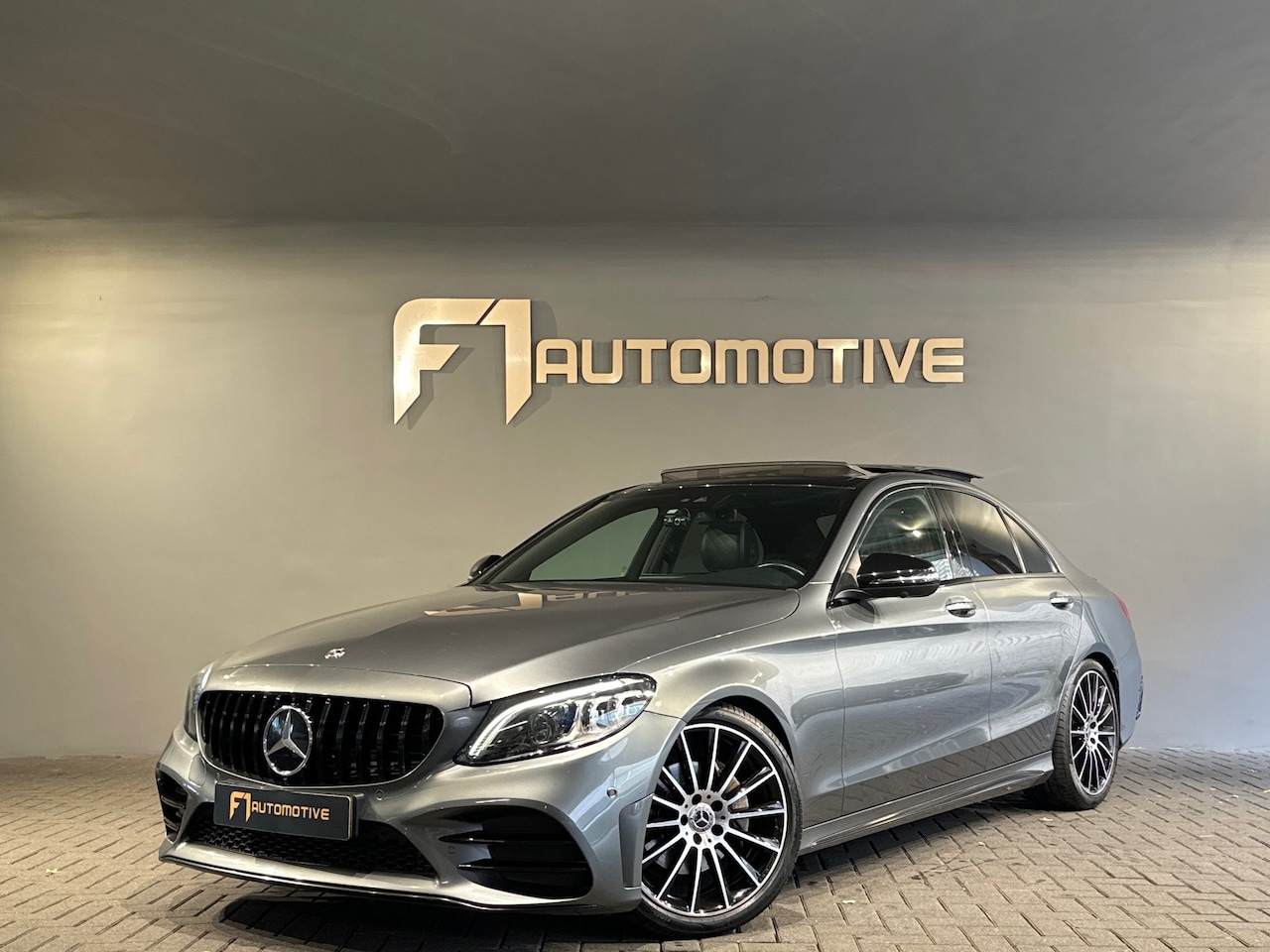 Mercedes-Benz C-klasse - 180 AMG Premium+ Pano|Keyless|Burmester - AutoWereld.nl