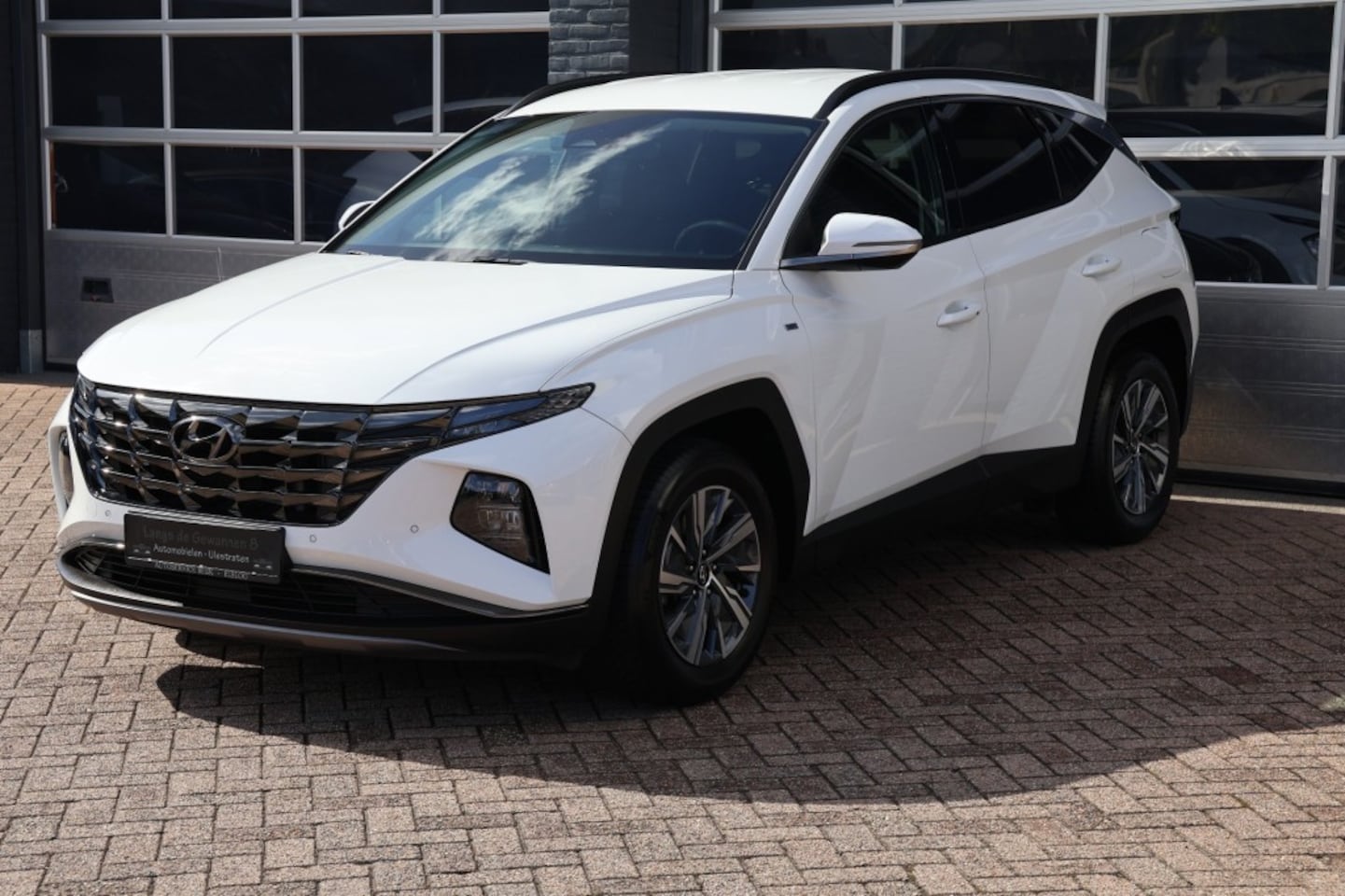 Hyundai Tucson - 1.6 T-GDI MHEV 150 pk navigatie,camera, 37205 km - AutoWereld.nl