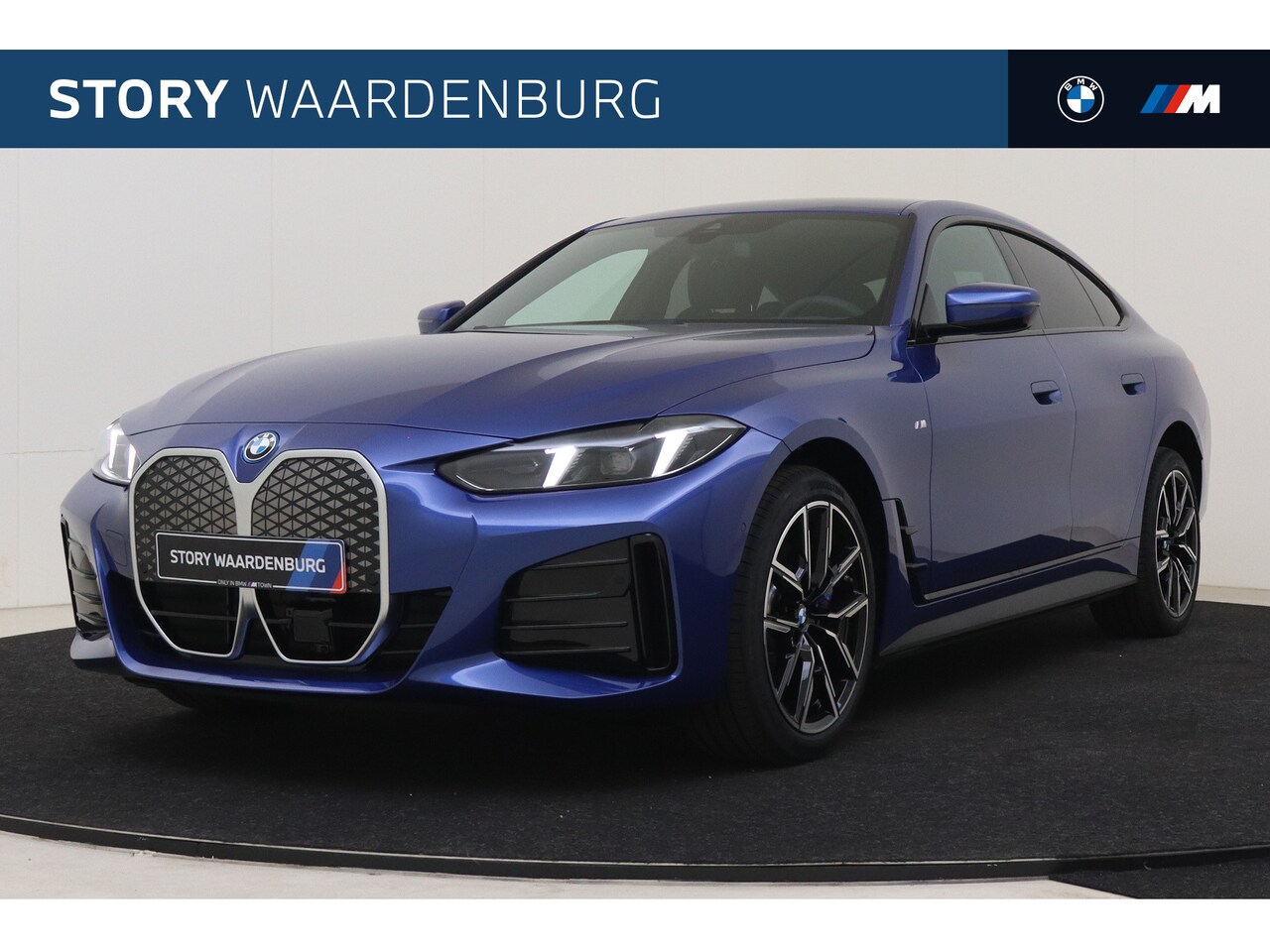 BMW i4 - eDrive35 M Sport / Achteruitrijcamera / Comfort Access / Active Cruise Control / Parking A - AutoWereld.nl