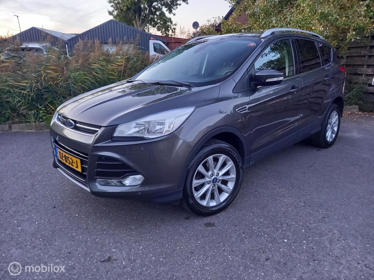 Ford Kuga - 1.5 Titanium Styling Pack 1.5 Titanium Styling Pack, Leer PDC Navi - AutoWereld.nl