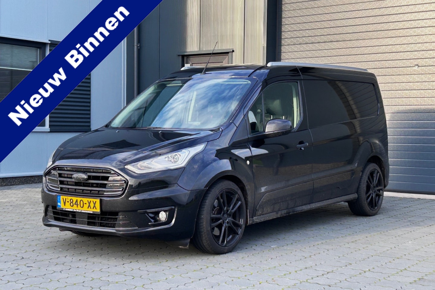 Ford Transit Connect - 1.5 120pk L2 Black Edition AUTOMAAT XENON LEER 18" NAVI CAMERA - AutoWereld.nl