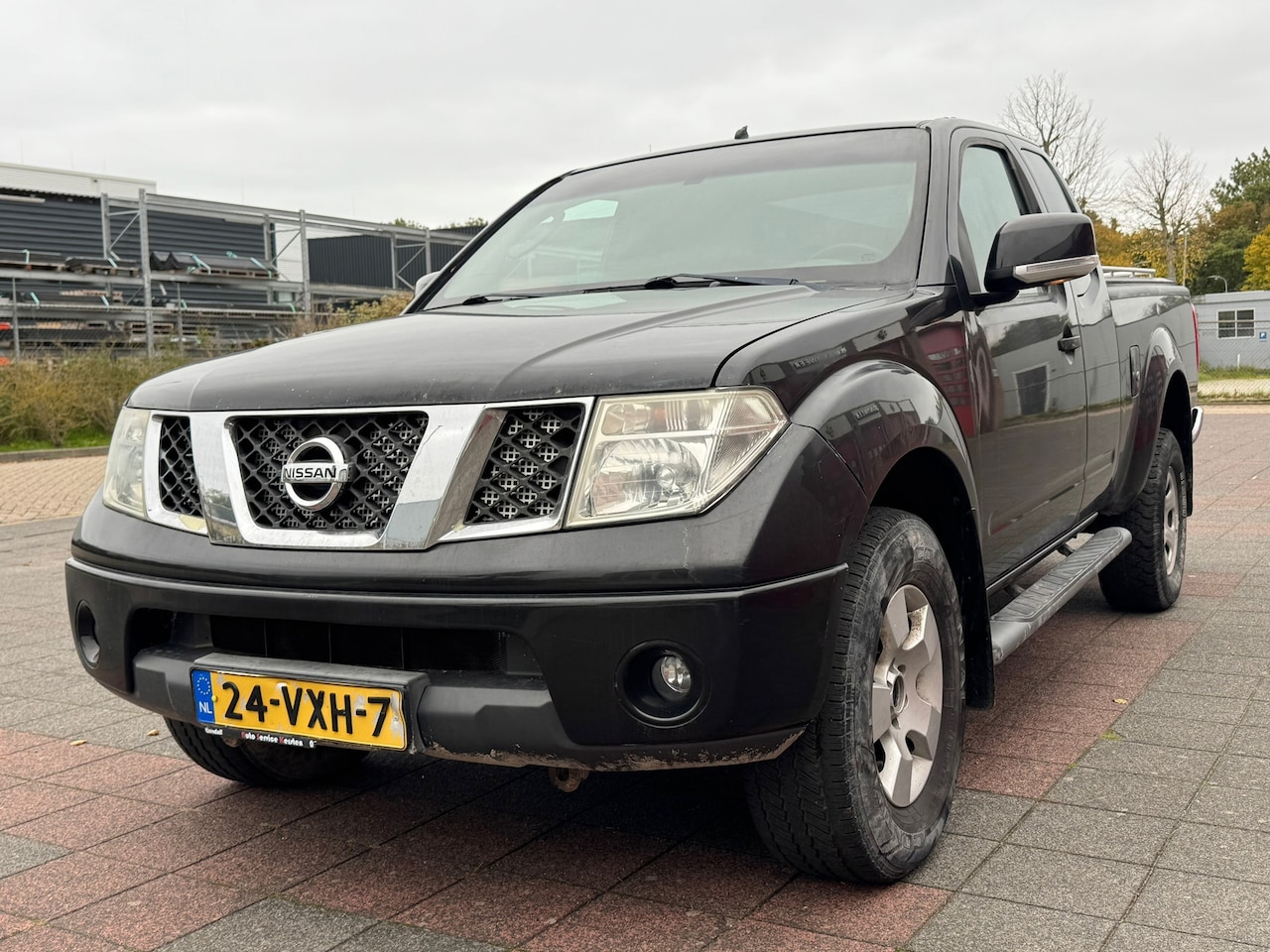 Nissan Navara - 2.5 dCi SE King Cab 4X4 - AutoWereld.nl