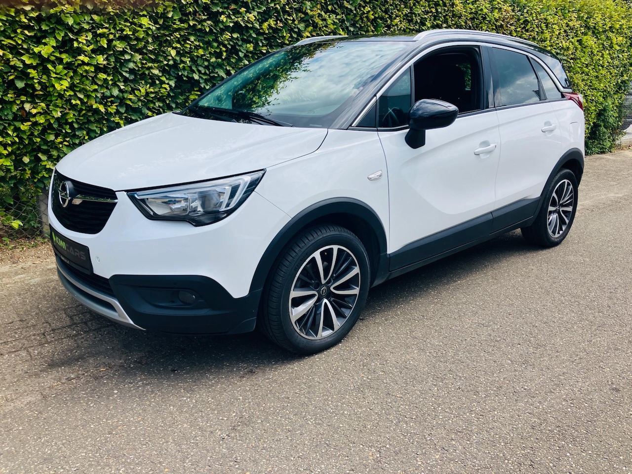 Opel Crossland X - 1.2 T Design Automaat - AutoWereld.nl