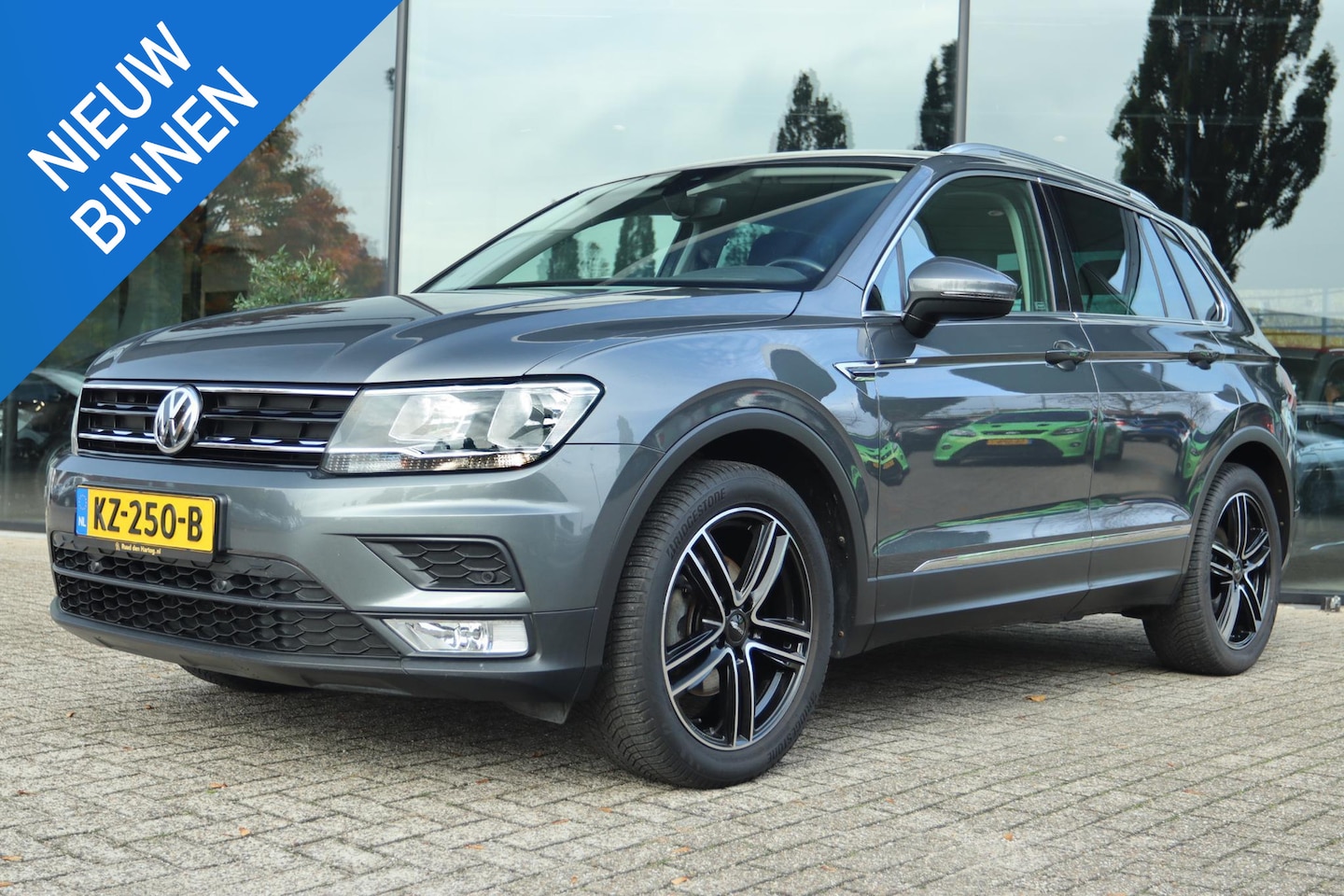 Volkswagen Tiguan - 1.4 TSI CONNECTED SERIES | TREKHAAK | CARPLAY | CRUISE | CLIMATE | PRIVACY | PDC - AutoWereld.nl