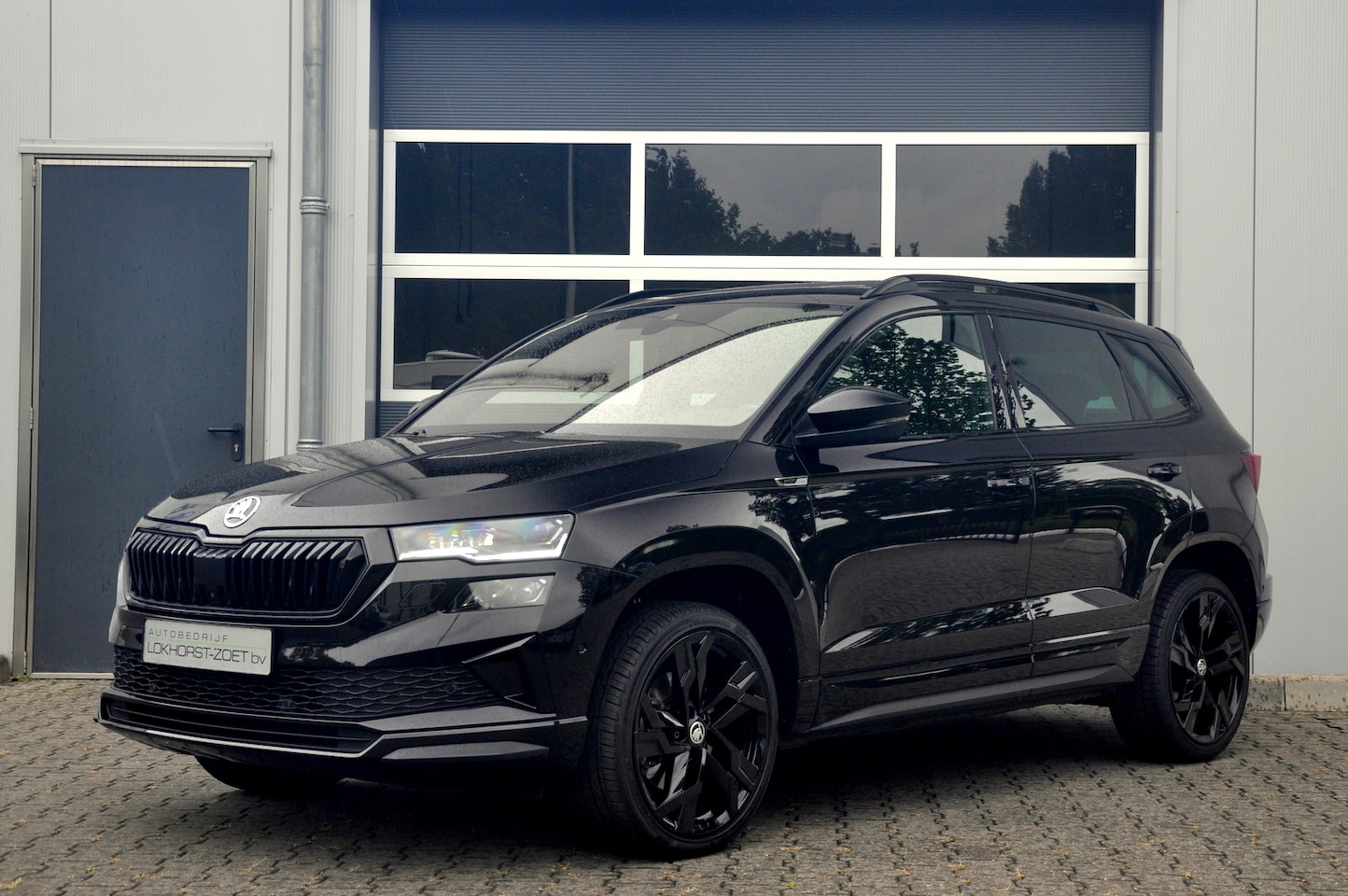 Skoda Karoq - 1.5 TSI ACT Sportline Business Automaat | Pano | ACC | Trekhaak - AutoWereld.nl