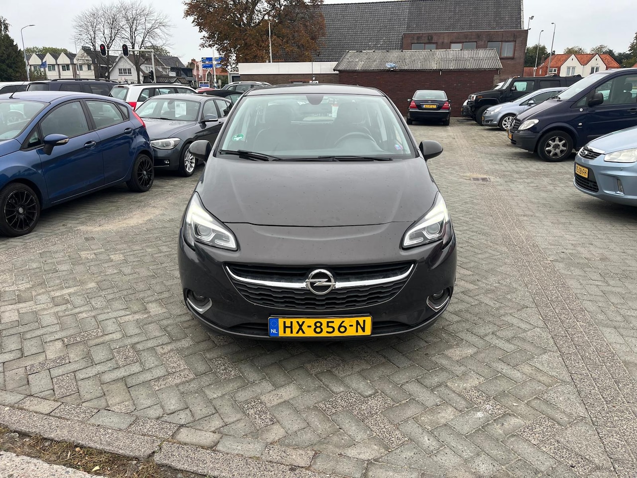 Opel Corsa - 1.4 Cosmo automaat airco sensoren lm velg - AutoWereld.nl