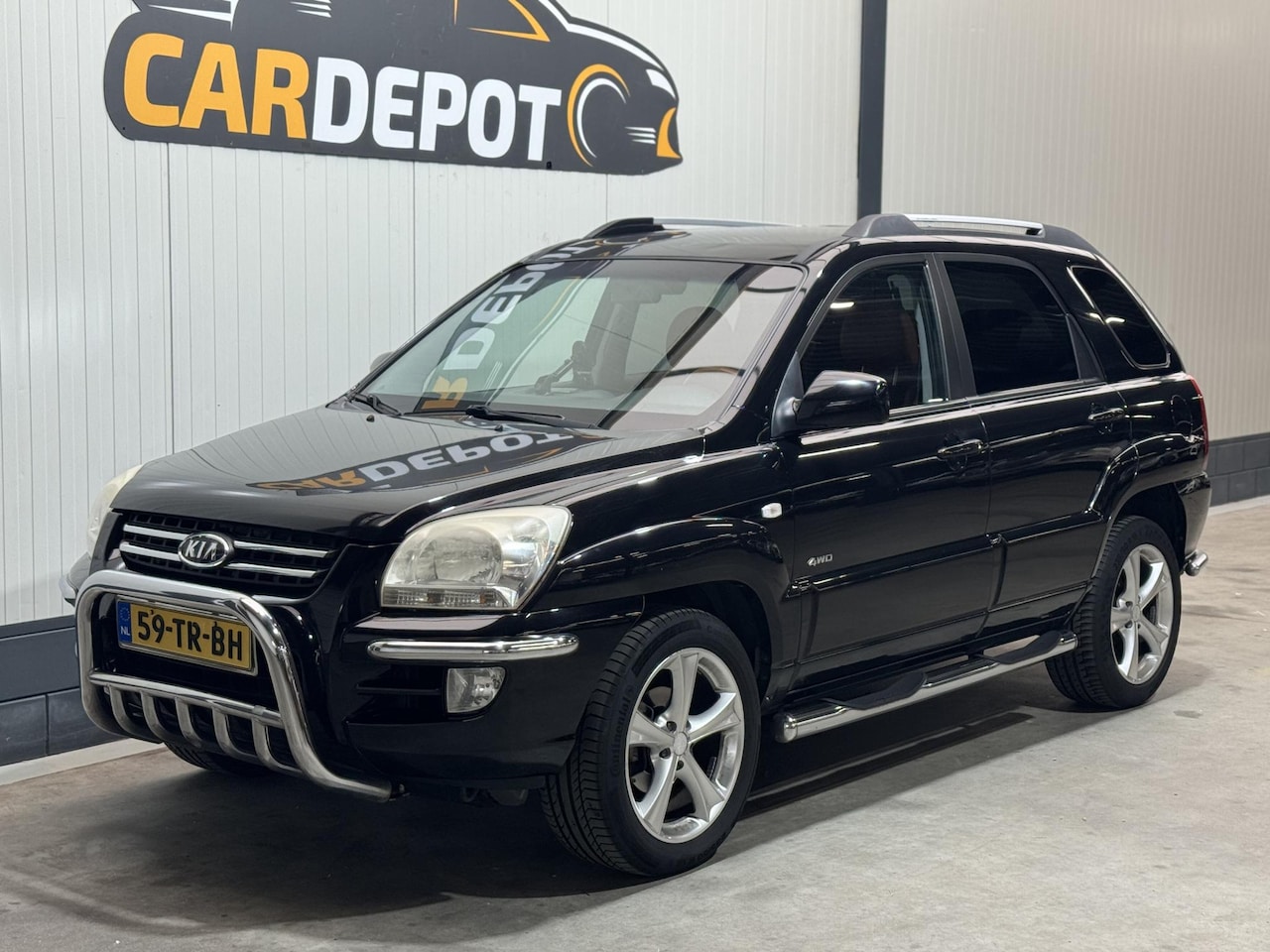 Kia Sportage - 2.7 V6 M-bition 4WD 2.7 V6 M-bition 4WD - AutoWereld.nl