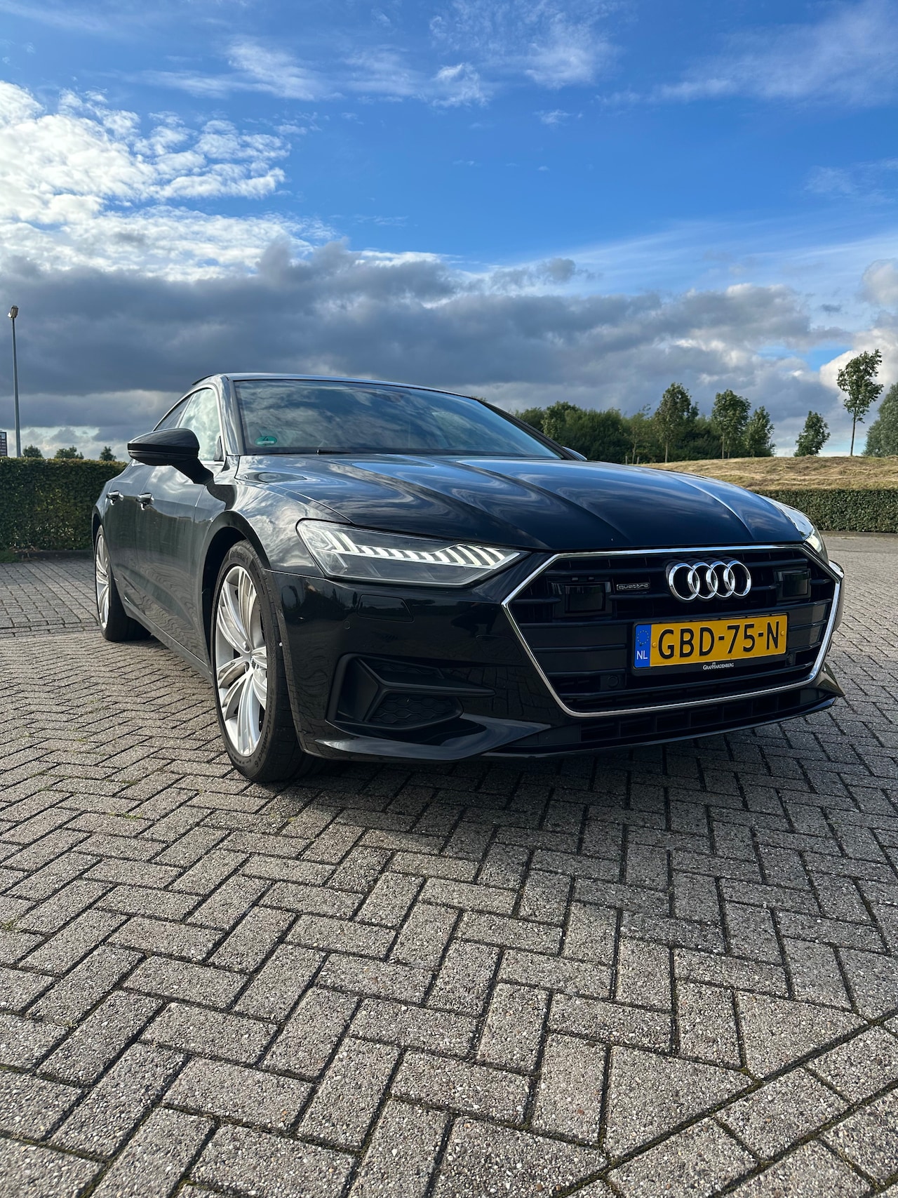 Audi A7 Sportback - 55 TFSI quattro Audi A7 55 TFSI Quattro 340pk 2018 Zwart Pano - AutoWereld.nl