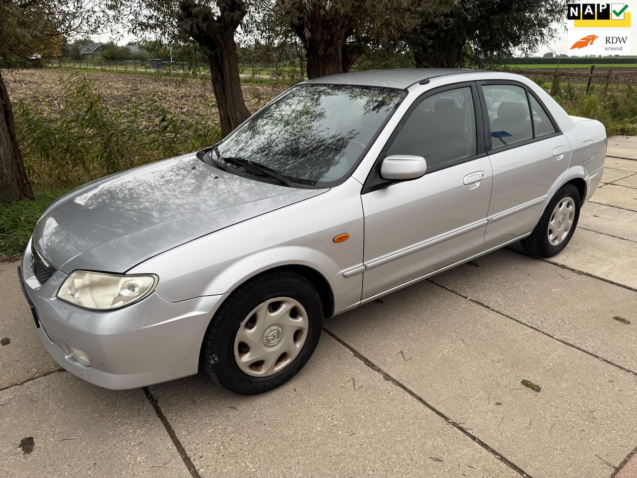 Mazda 323 - 1.6i 2001 95PK AUTOMAAT/AIRCO/ONDERHOUDEN/MOOI - AutoWereld.nl