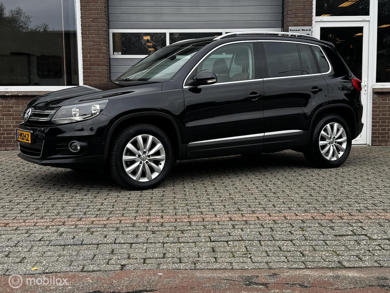 Volkswagen Tiguan - 2.0 TSI 4 MOTION AIRCO/CRUISE/STOEL.VW - AutoWereld.nl