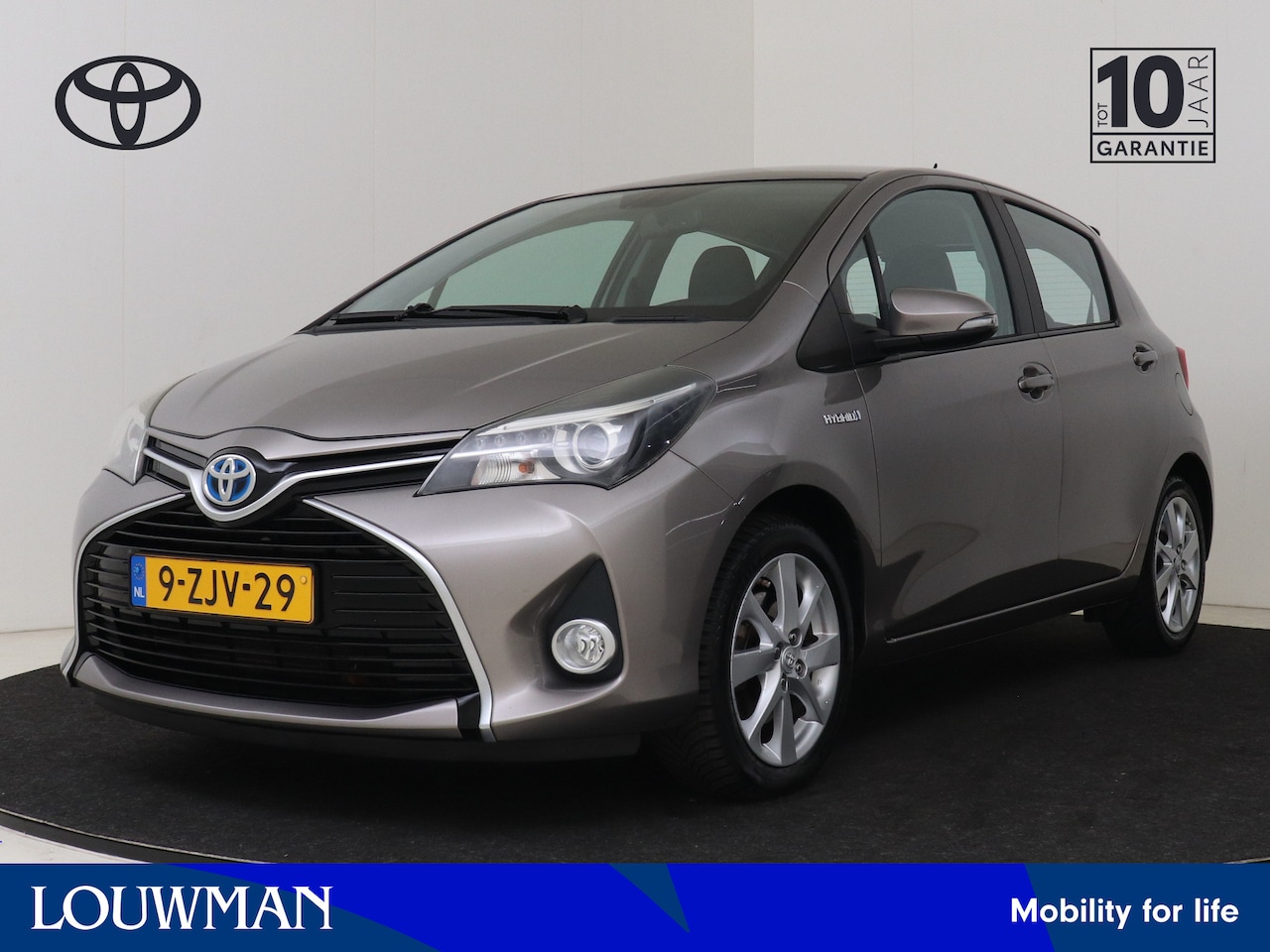 Toyota Yaris - 1.5 Hybrid Dynamic poetsen 02-10 - AutoWereld.nl
