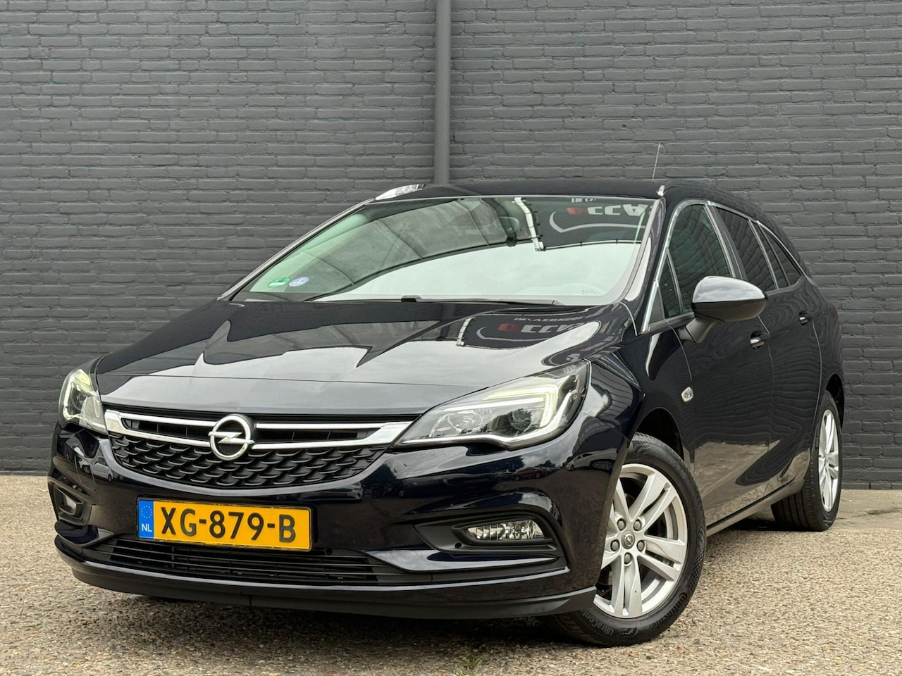 Opel Astra Sports Tourer - 1.0 Turbo Online Edition PDC | 1STE EIGEN | TREKHAAK | AIRCO | BTW | NWE APK - AutoWereld.nl