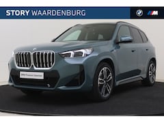 BMW X1 - xDrive23i High Executive M Sport Automaat / Panoramadak / Sportstoelen / Trekhaak / Parkin