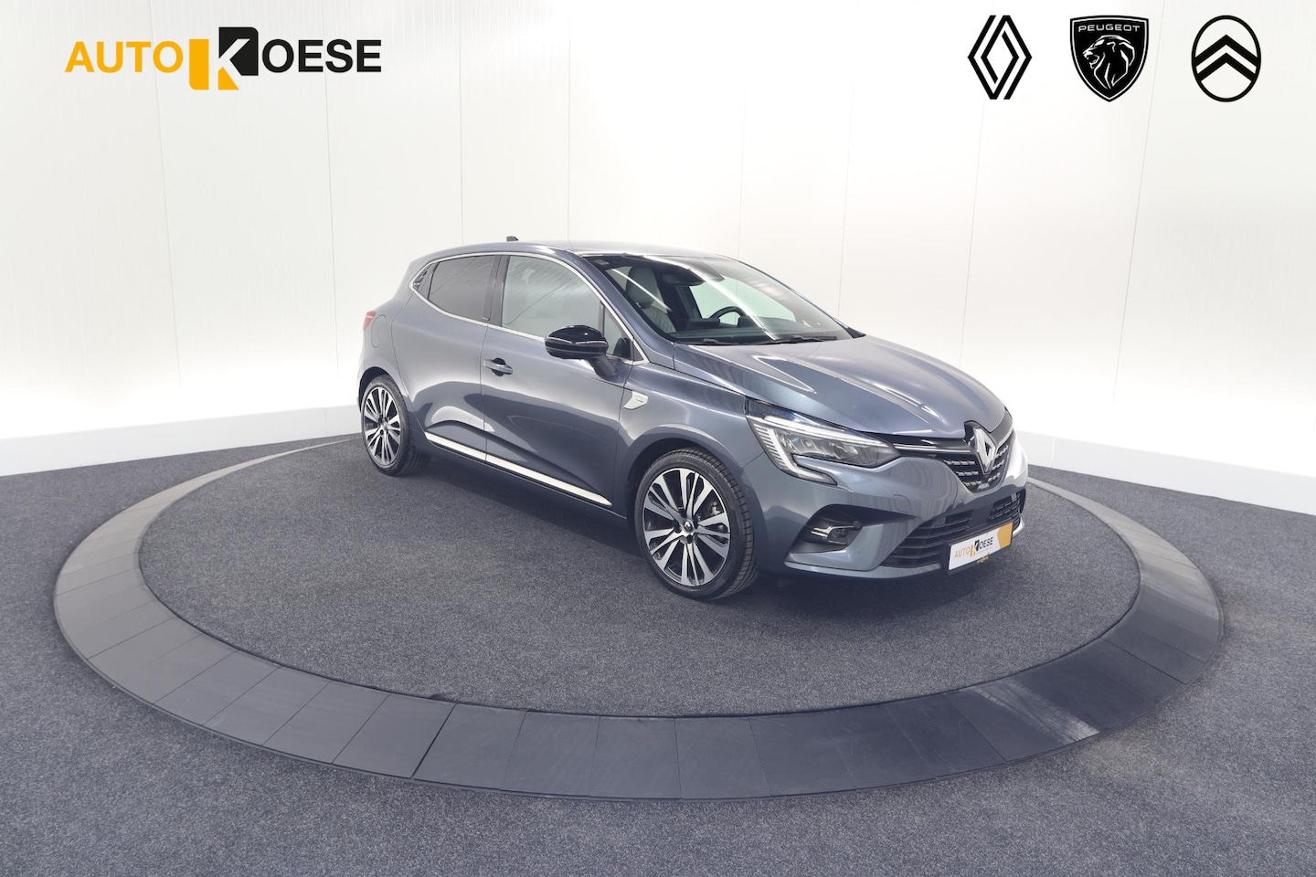 Renault Clio - 1.6 E-Tech Hybrid 140 Initiale Paris | Trekhaak | Rondom Camerazicht | Adaptieve Cruise Co - AutoWereld.nl