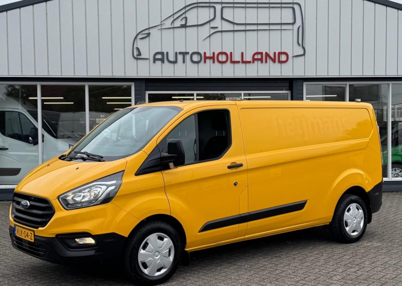 Ford Transit Custom - 2.0 TDCI 96KW 131PK L2H1 EURO 6 AIRCO/ CRUISE CONTROL/TREKHAAK/ 100% DEALERONDERHOUDEN - AutoWereld.nl