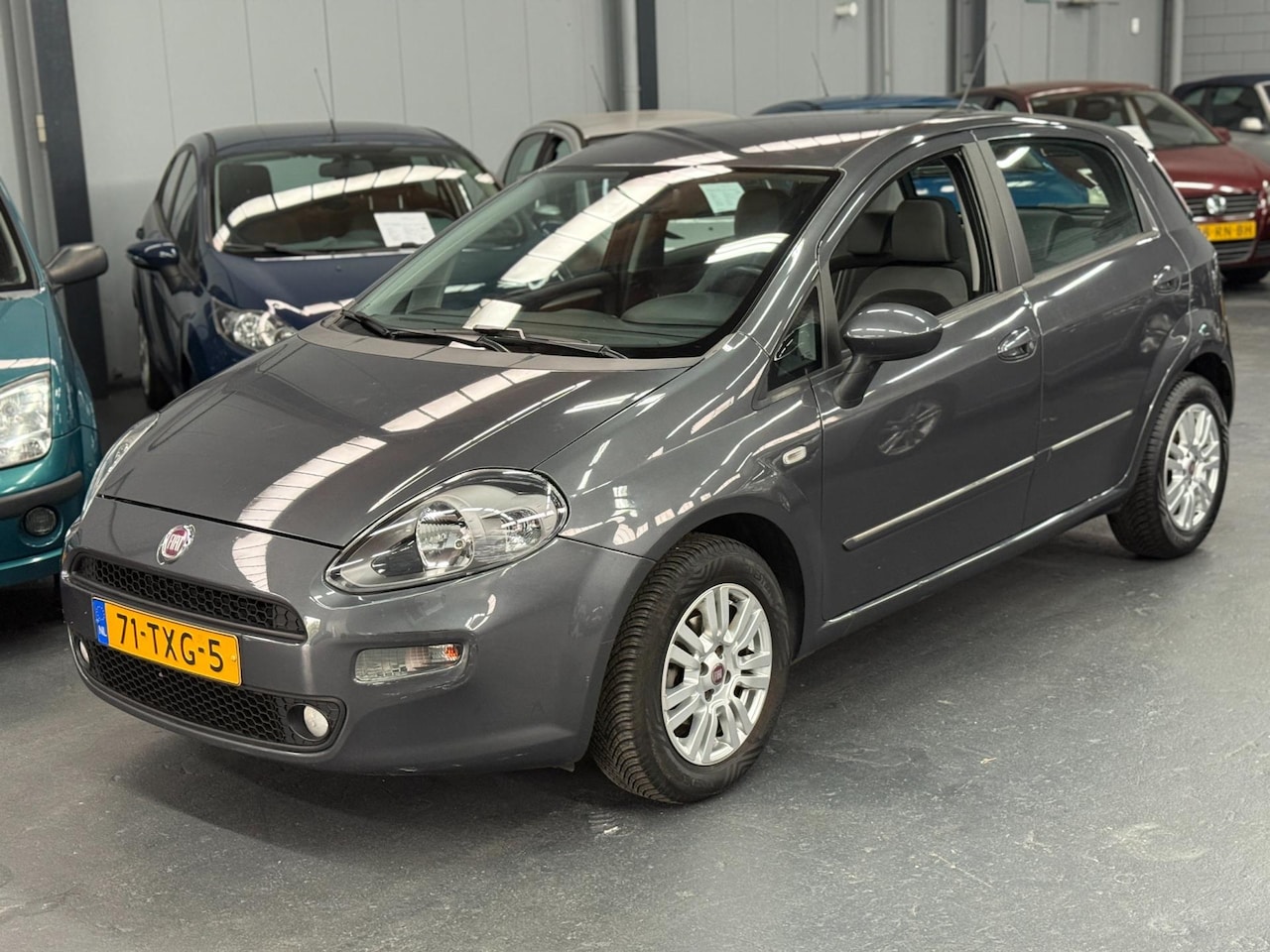 Fiat Punto Evo - 1.4 Racing Automaat 1ste Eigenaar APK NAP - AutoWereld.nl