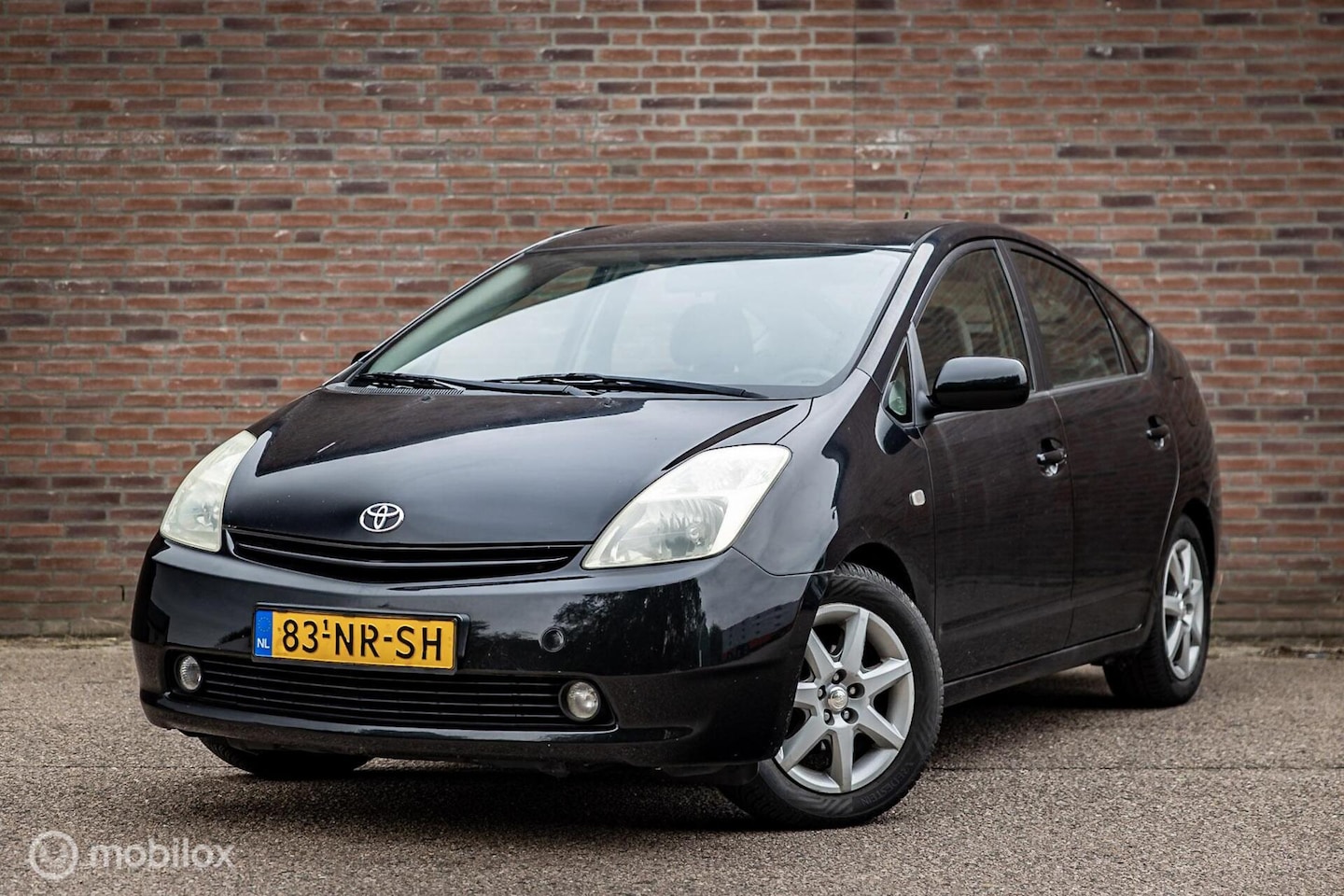 Toyota Prius - 1.5 VVT-i | Nap | Navi | LM Velgen - AutoWereld.nl