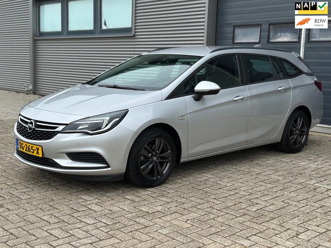 Opel Astra Sports Tourer - 1.0 Online Edition AUTOMAAT - NAVI - TREKHAAK - DEALER ONDERHOUDEN!!! - AutoWereld.nl