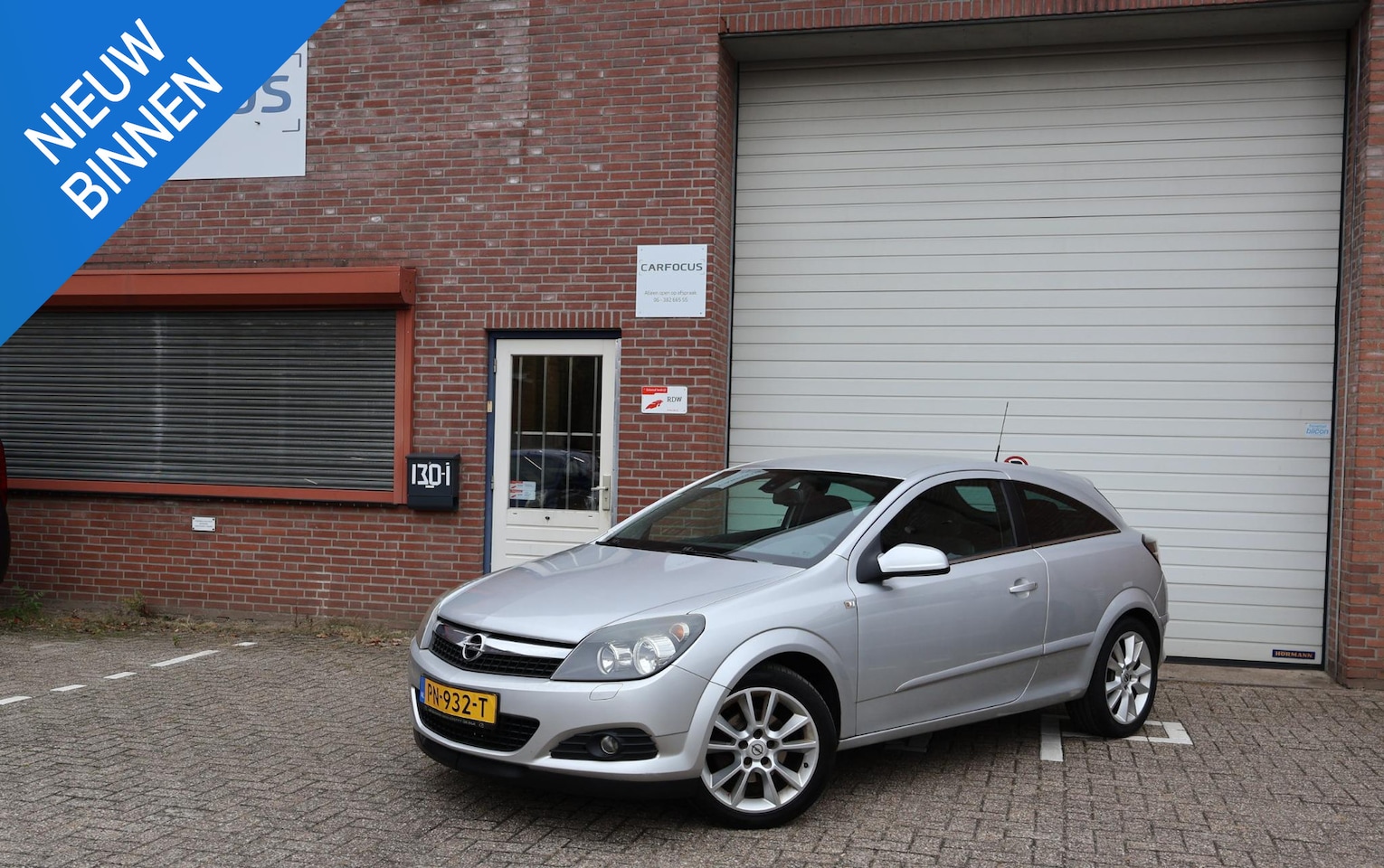 Opel Astra GTC - 1.6 Edition APK Airco PDC Cruise - AutoWereld.nl