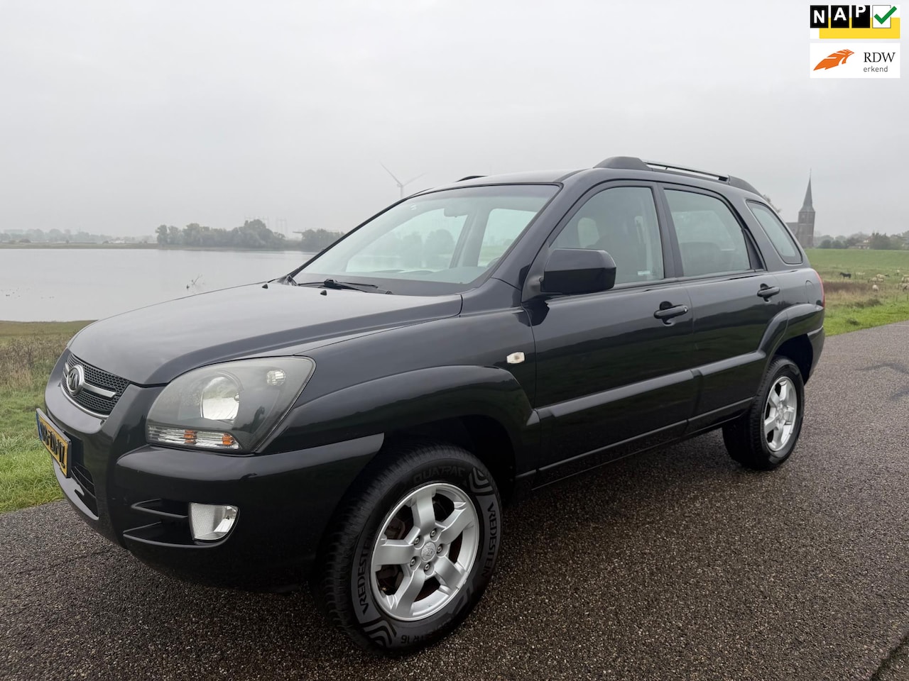 Kia Sportage - 2.0 CVVT X-ecutive 2.0 CVVT X-ecutive - AutoWereld.nl