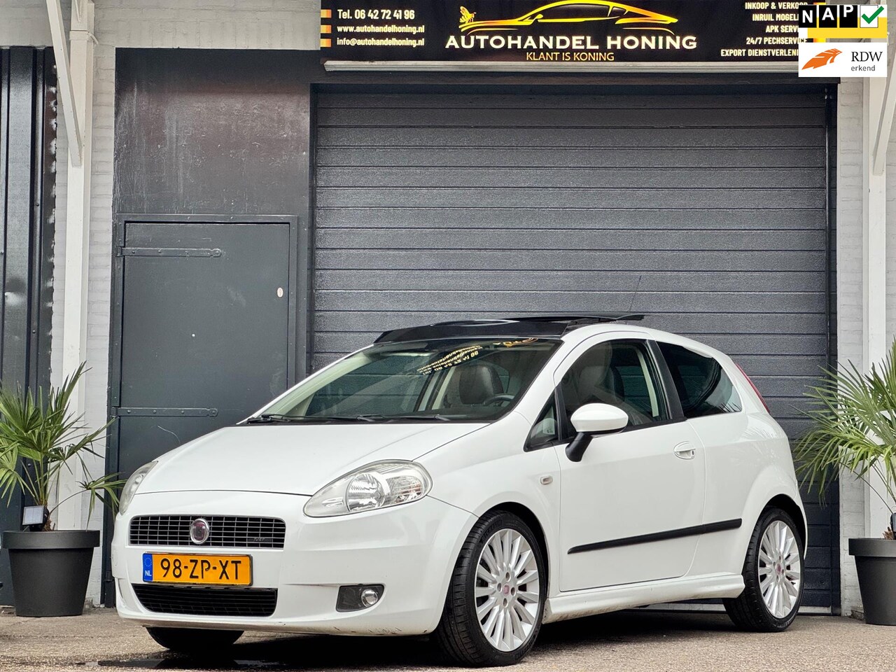 Fiat Grande Punto - 1.4-TURBO SPORT|*NIEUW TURBO|PANO|TREKHAAK|AIRCO - AutoWereld.nl