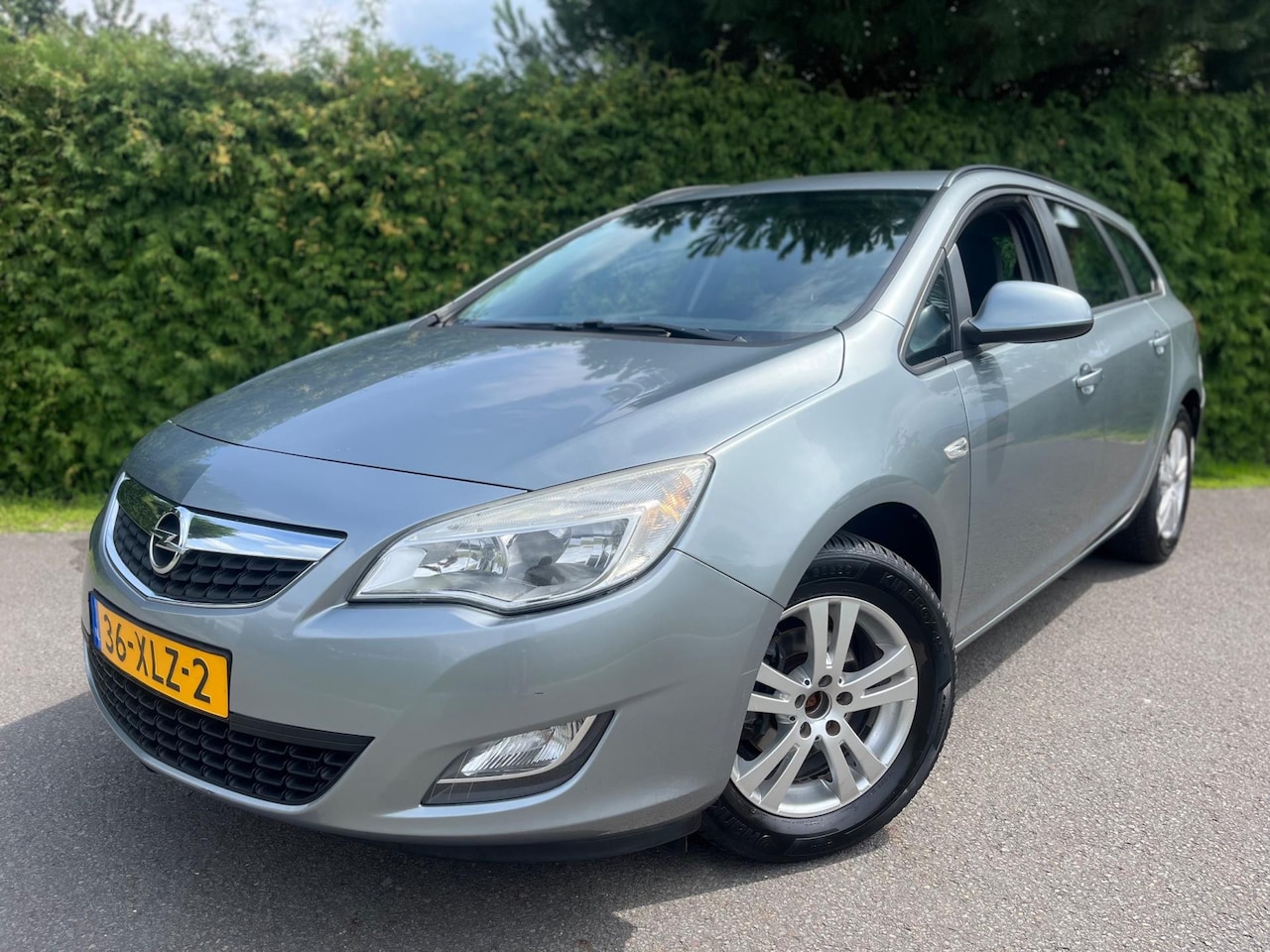 Opel Astra Sports Tourer - 1.4 Business + NAVIGATIE AIRCO NAP APK KOOPJE !! - AutoWereld.nl