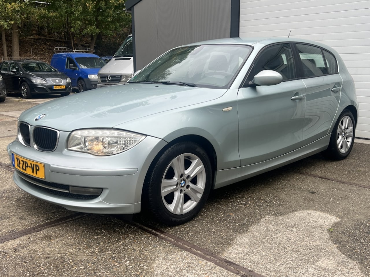 BMW 1-serie - 116i Business Line | Airco | 5drs | Lm velgen - AutoWereld.nl