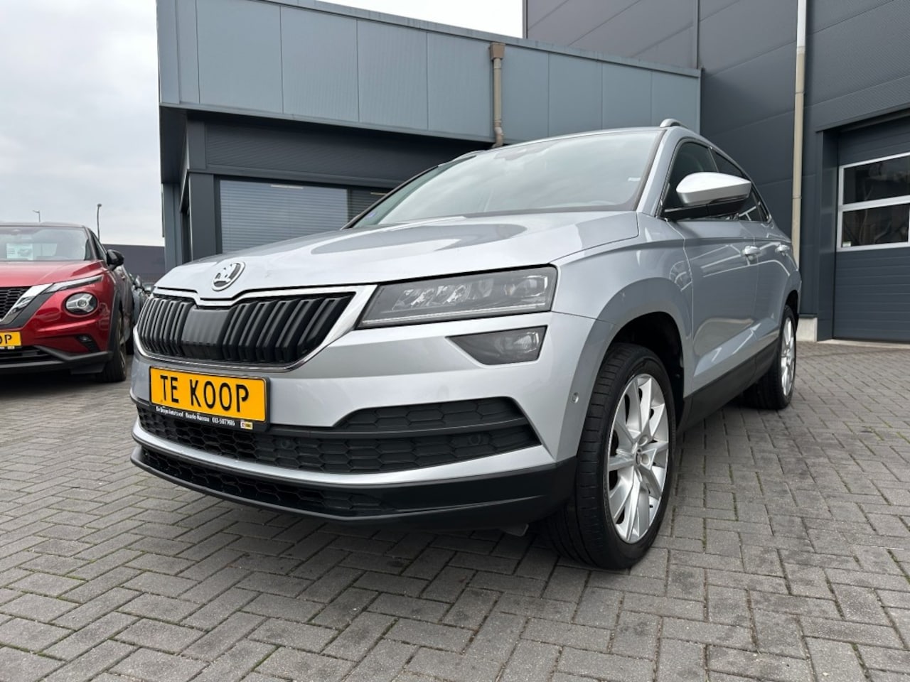 Skoda Karoq - 1.0 TSi Ambition Business Camera Leder Trekhaak - AutoWereld.nl