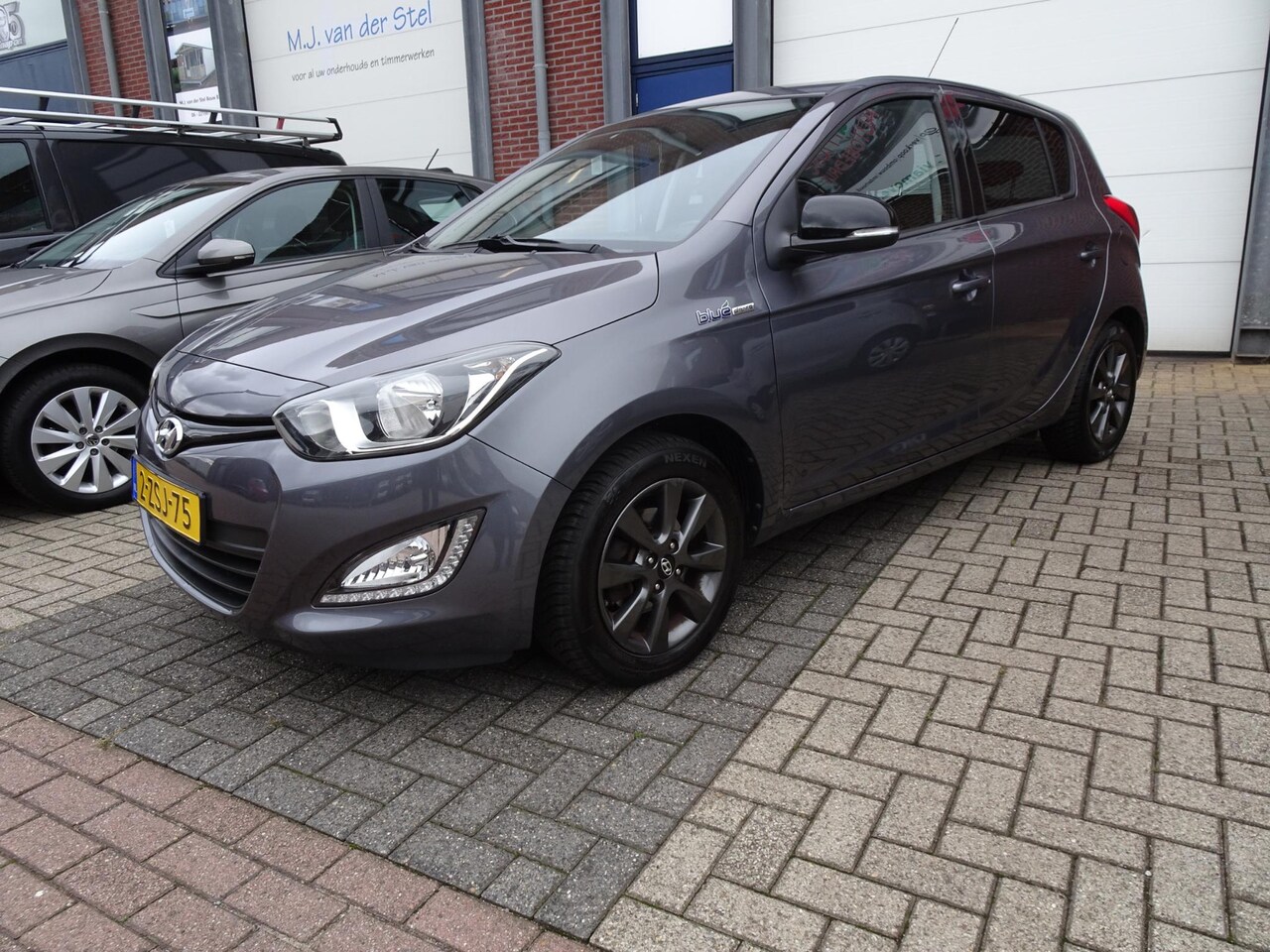 Hyundai i20 - 1.2 HP i-Motion Airco l Trekhaak l Allseason - AutoWereld.nl