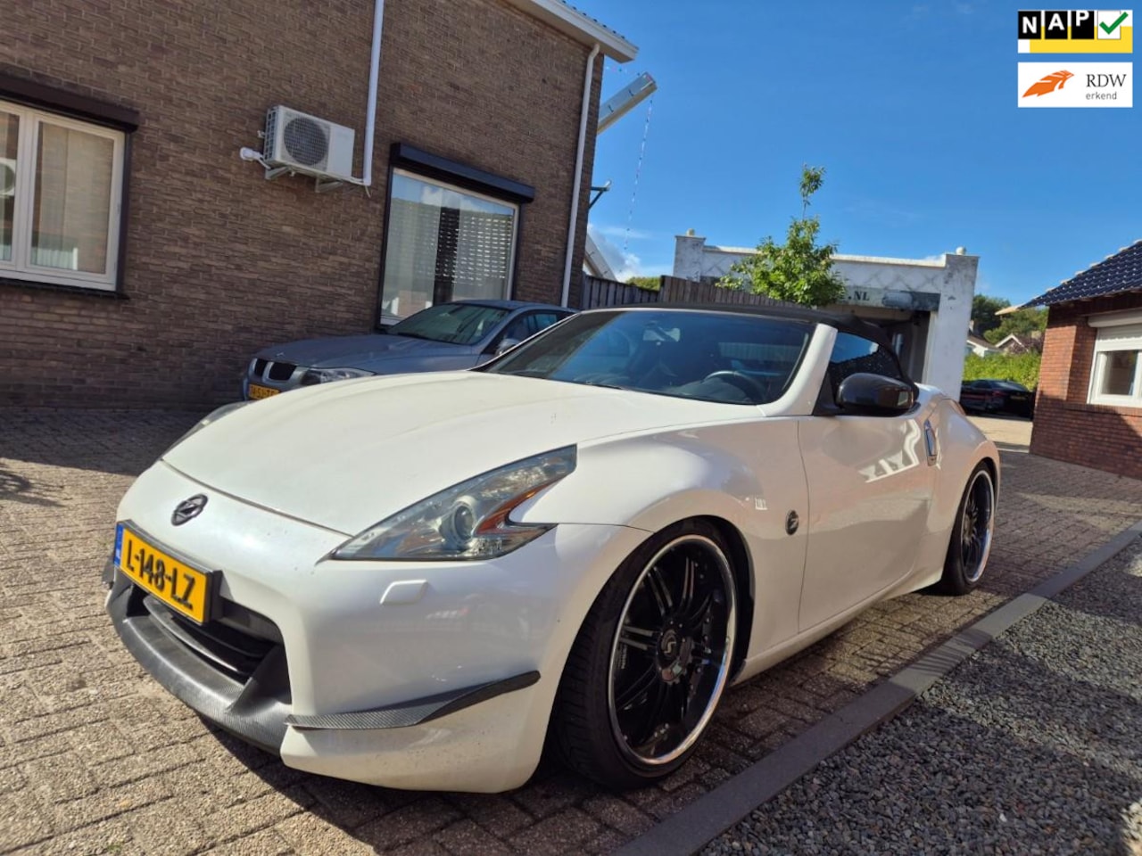 Nissan 370Z Roadster - 3.7 V6 Pack Stillen Supercharged - AutoWereld.nl