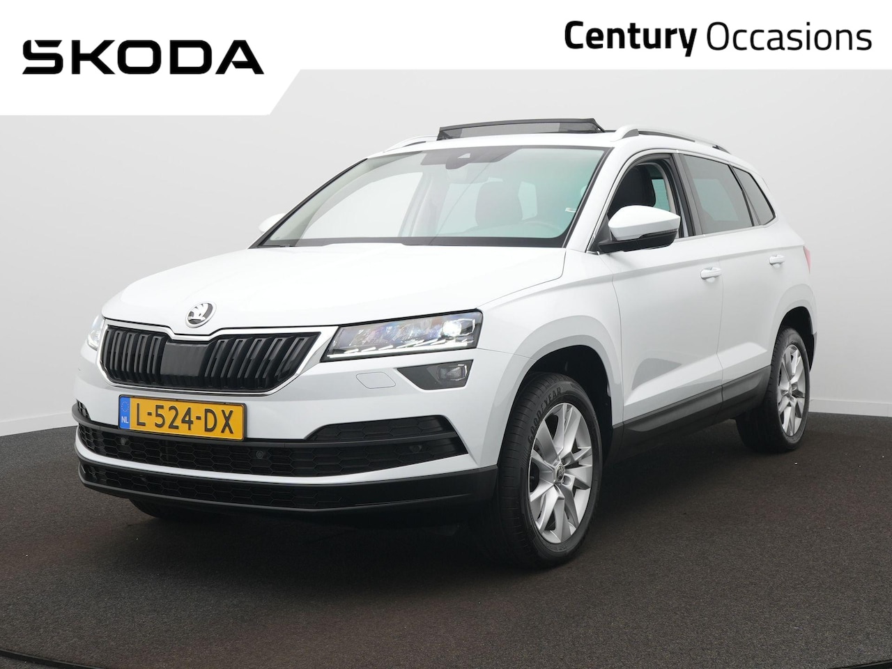 Skoda Karoq - 1.5 TSI ACT Business Edition Plus DSG / Panodak / Elek. Stoel / Elek. Trekhaak - AutoWereld.nl