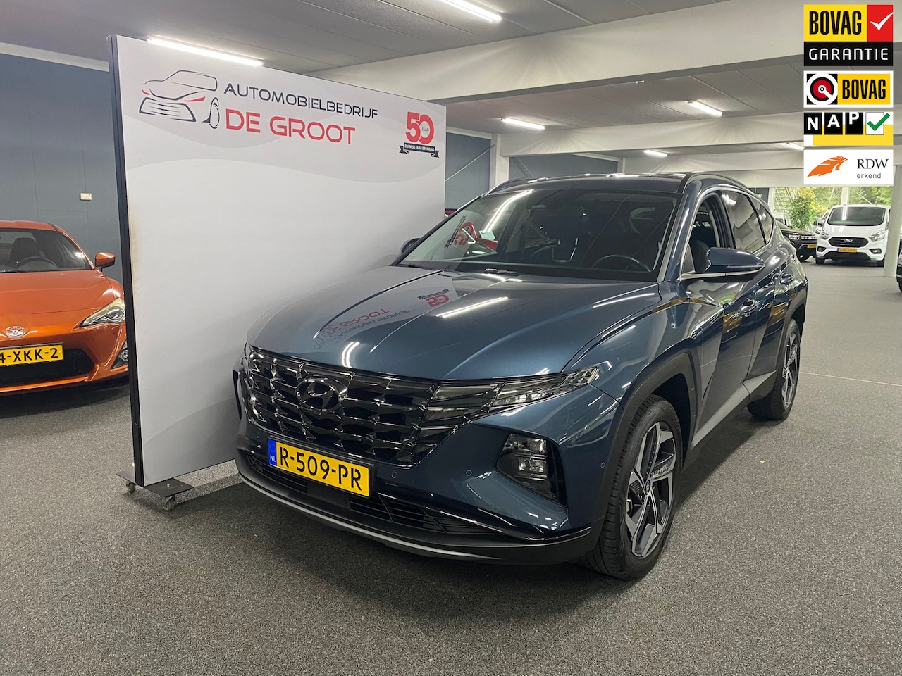 Hyundai Tucson - 1.6 T-GDI HEV Premium/ Eerste eigenaar/ Automaat/ Lederen bekleding/ Apple caplay/ Android - AutoWereld.nl