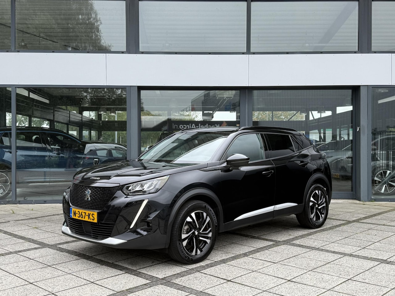 Peugeot e-2008 - EV Blue Lease Allure 50 kWh | Navi | Led | Stoel Verw. | - AutoWereld.nl