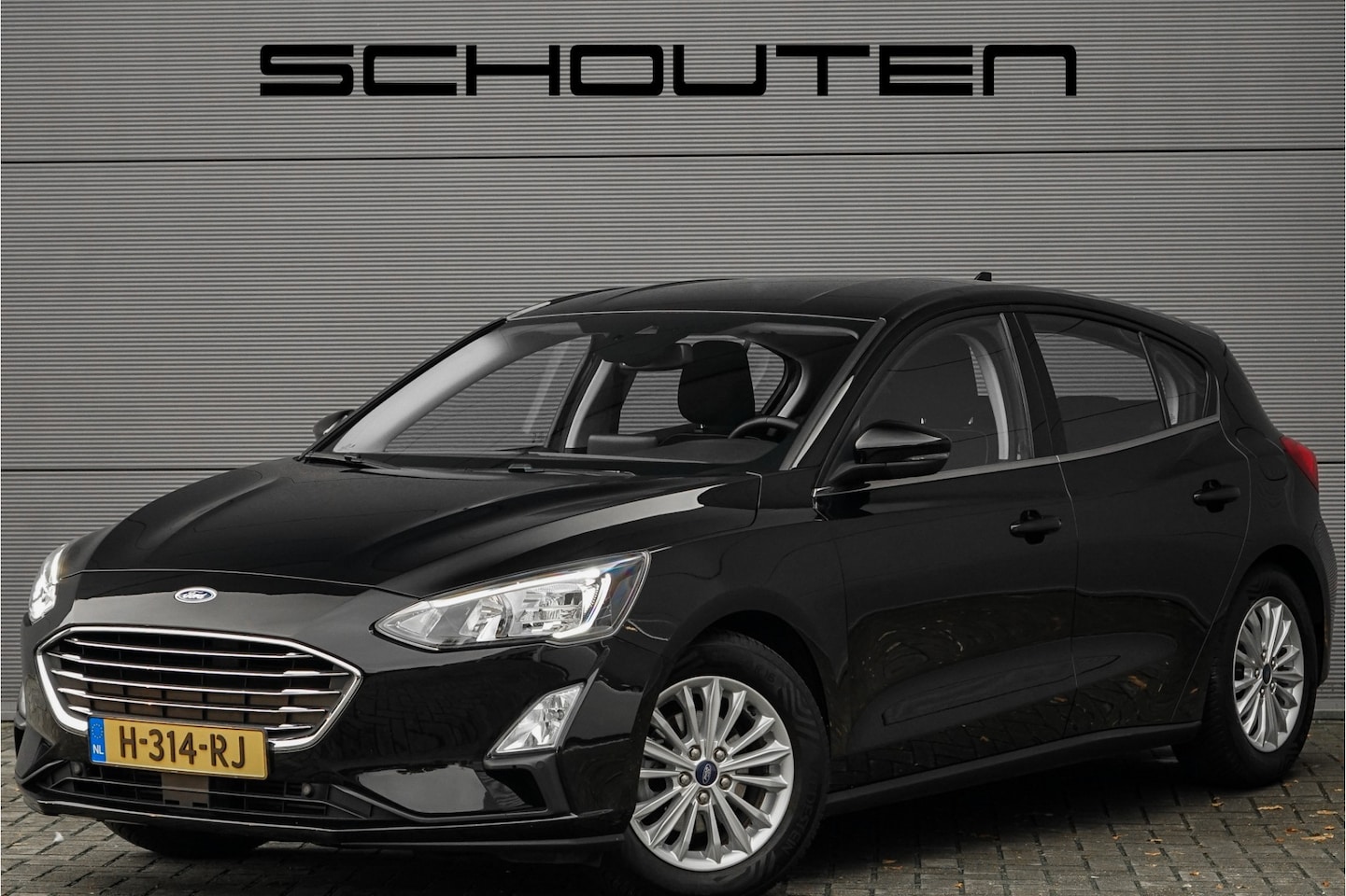 Ford Focus - 1.0 EcoBoost Titanium Business PDC Navi 16" - AutoWereld.nl