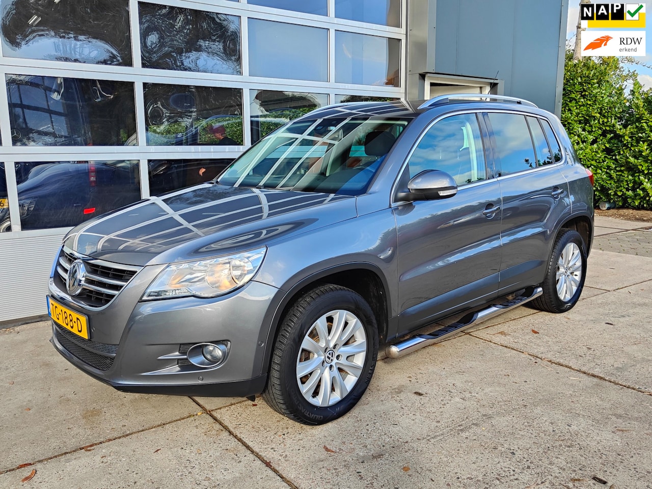 Volkswagen Tiguan - 2.0 TSI Sport&Style 4Motion automaat - AutoWereld.nl